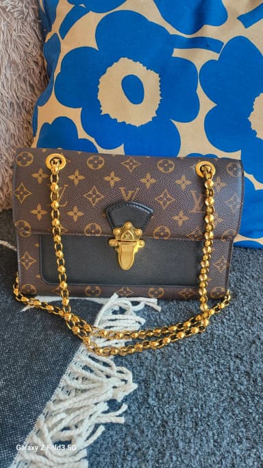 Louis Vuitton Victoire schwarze Handtasche für Damen und Herren