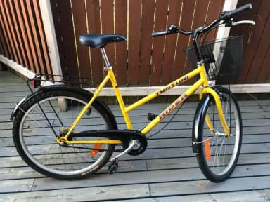Bicicleta urbana Tunturi Rider para mujer 26 pulgadas con 3 velocidades amarilla