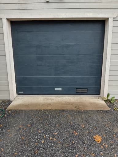 Krispol garage door with electric opener in gray