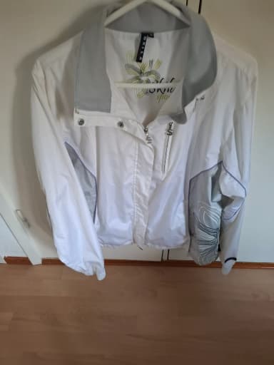 Lightweight white Skila Sport outdoor jacket for women size 46