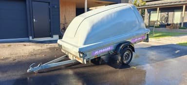 JC trailer with 28 L capacity and cover