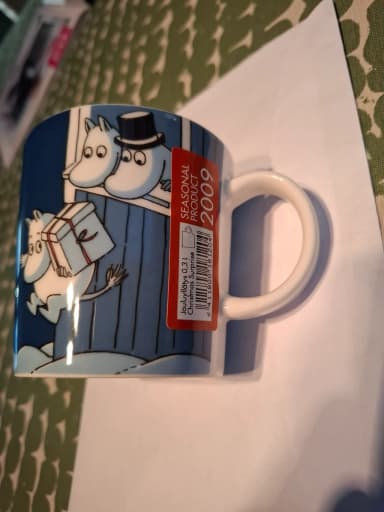 Taza Moomin sorpresa de Navidad 2009 sin usar en excelente estado