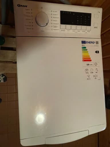Hvit Gram topplastet vaskemaskin med 7 kg kapasitet