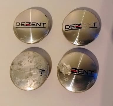 Tapas centrales Dezent para agujeros de 56 mm en buen estado
