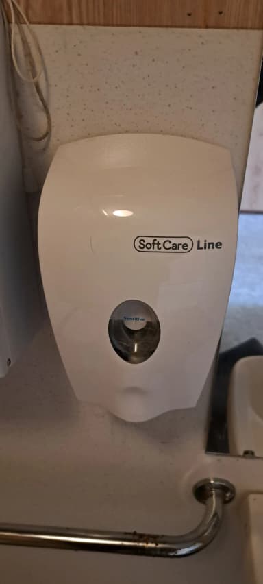 Dispensador de jabón SoftCare Line para pared en blanco