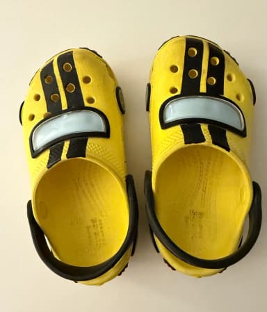 Yellow Crocs kids' sandals with car design size 27