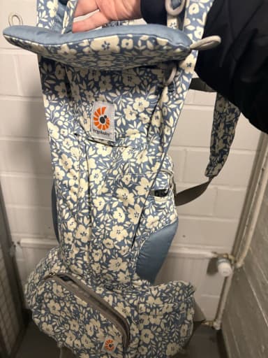 Ergobaby Omni baby carrier with blue floral pattern
