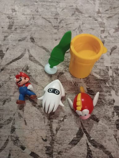 Super Mario character figures set with various plastic parts