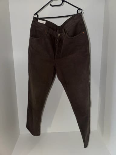 Brown jeans in visible condition