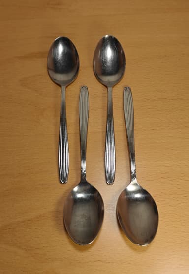 Set of 4 vintage Japanese stainless steel spoons in Scandia style
