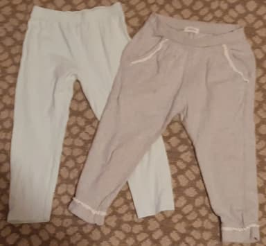 Two pairs of basic used leggings with minor wear