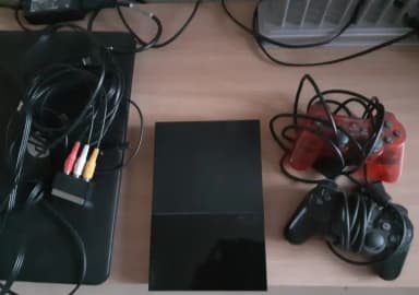 PS2 slim Konsole mit 2 Controllern und 19 Spielen in gutem Zustand