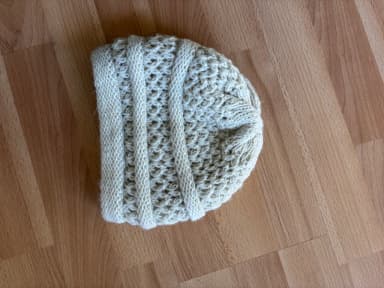 Light natural-colored warm wool hat in good condition