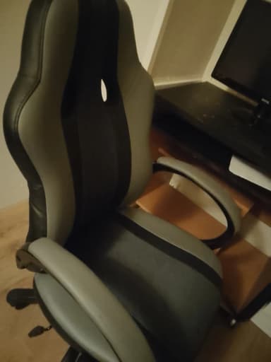 Silla de oficina y gaming negra y gris con reposabrazos