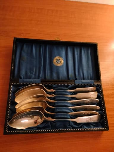 Vintage silver spoons from 1926 and 1938 with engravings