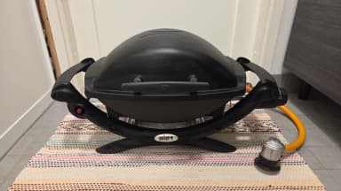 Parrilla de gas Weber Q1000 con regulador para botella grande