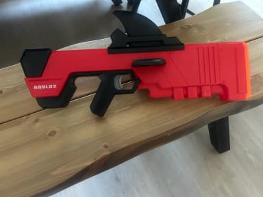 Roblox red and black toy Nerf gun