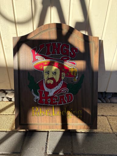 Vintage darts board with Kings Head Pub wooden cabinet