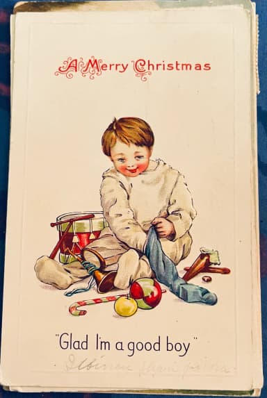 Weihnachtspostkarte 1923 mit Jungen und Spielzeug