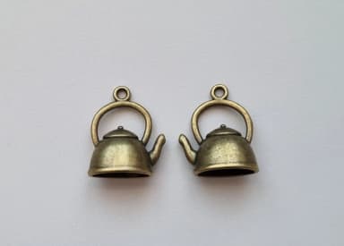 Two bronze-colored miniature teapots charms