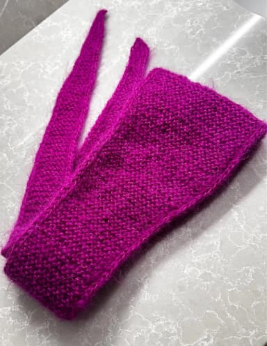 Knitted scarf available in auction