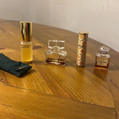 Set of 4 miniature perfume bottles including Chanel