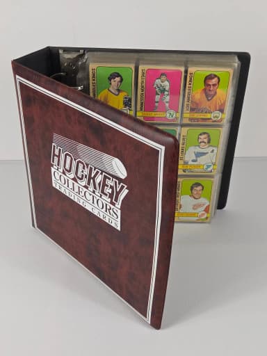 Binder with vintage 1970s hockey card collection