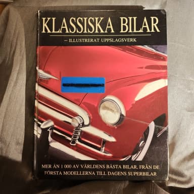 libro ilustrado de referencia sobre autos clásicos