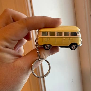 Yellow Volkswagen Beetle keychain from the 60s vintage car era