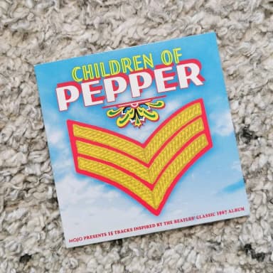CD de 15 canciones de Children of Pepper Mojo inspirado en clásico de Beatles 19