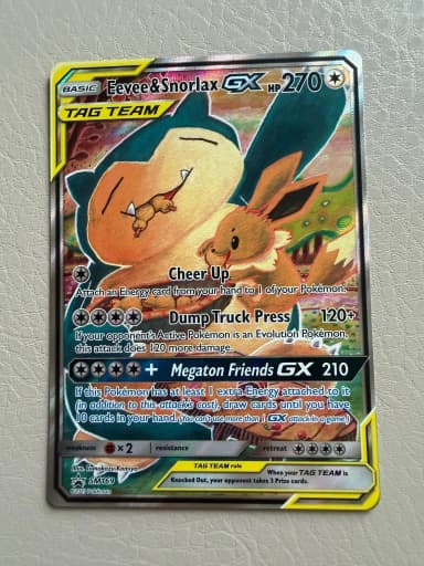 Carta Pokémon Eevee & Snorlax GX Promo Black Star 2019