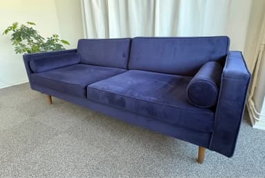 Beleco Wind blaue Couch in sehr gutem Zustand