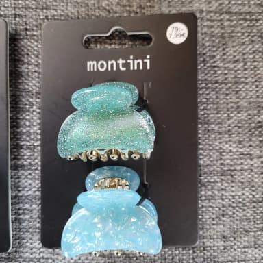 Pinzas para el cabello Montini en subasta