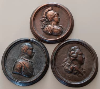 Three royal medallions featuring Queen Christina and Kings Gustav III and IV Ado