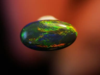 0.45ct black opal from Lightning Ridge, Australia