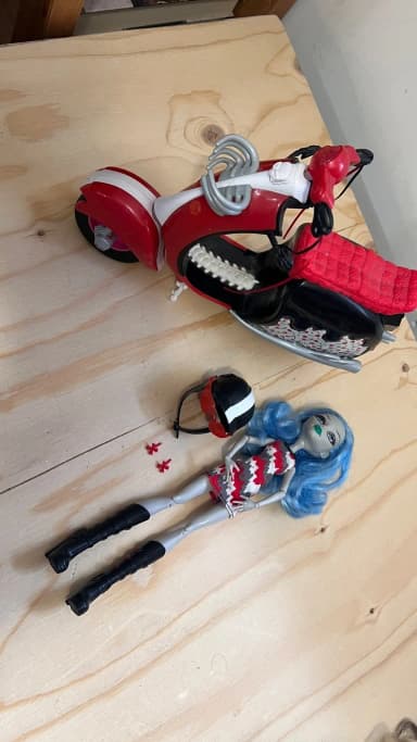 Monster High Ghoulia Yelps fashion doll with scooter
