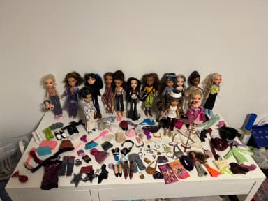 Large collection of Bratz dolls with accessories