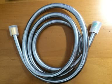 Manguera de ducha Hansgrohe Isifex cromada y dorada, 2 metros