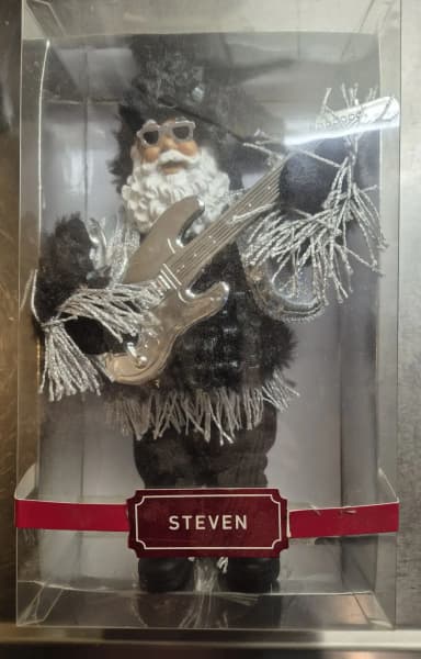 Tomte Steven rockstar figurine at auction
