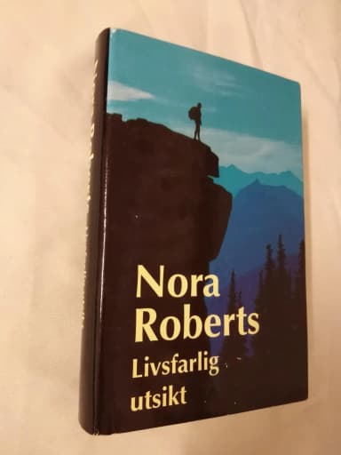 Livsfarligt utsikt Nora Robertsilta, sidottu kirja suojakuorella