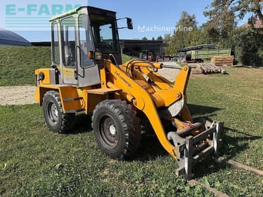 Mini excavadora Zettelmeyer ZL 602 con cabina y cucharas de 1994