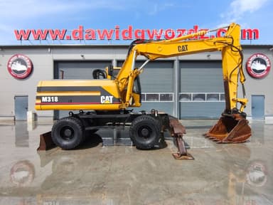 Excavadora de ruedas Caterpillar M318 del año 1997