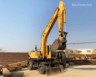 Excavadora de ruedas Hyundai 210W de 2014 con capacidad de 21 toneladas