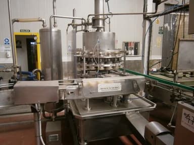 Máquina tapadora Comaco AGM4Cerradora para botellas