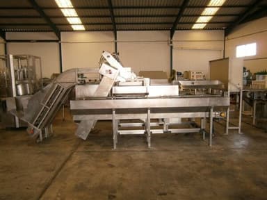 Máquina de llenado y dosificación FMA del año 2000 en España