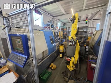Torno metálico Hyundai HIT-200C y FANUC M-20iA de banco, año 2003
