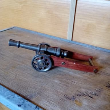 Decorative metal and wood cannon model
