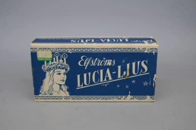 Vanha laatikko Elfströmin Lucia-kynttilöillä 1900-luvulta