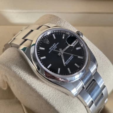 Rolex Oyster Perpetual Date 34 schwarz Modell 115200 in gewartetem Zustand