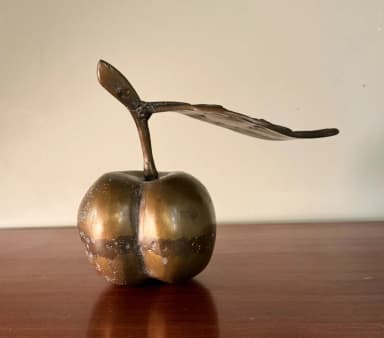 Brutalist bronze cherry sculpture